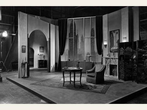 The black-and-white apartment set for The Velvet Hour.