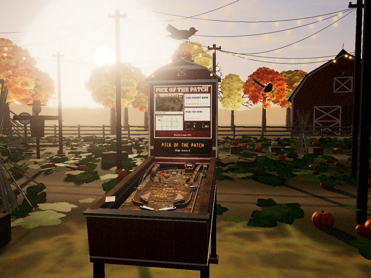 The PICK OF THE PATCH cabinet, barn red boards with white trim and a gambrel barn roof on the backbox, a jack-o'-lantern on top, standing at the edge of a pumpkin patch at golden hour, with string lights overhead and autumn trees and a red barn behind it.